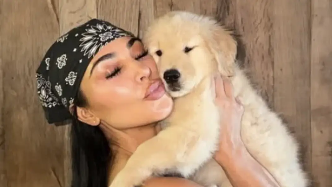 Kim Kardashian posted a snap of her and the new pooch, Halo. Credit: Instagram/@kimkardashian