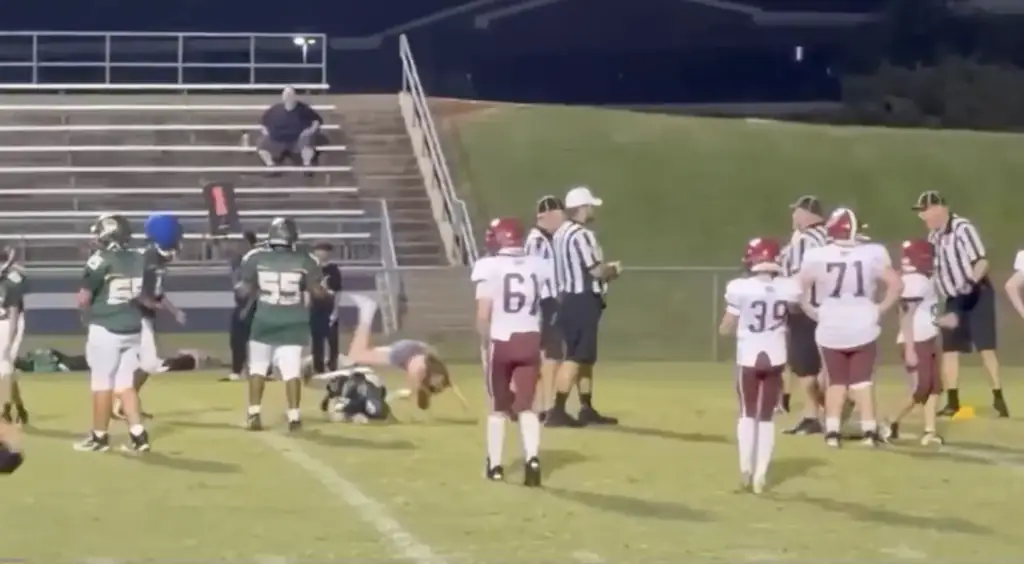 Addison Hunnicutt charges onto an American Football field to tackle a player she thought was bullying her brother. Credit: News Channel 5 Nashville