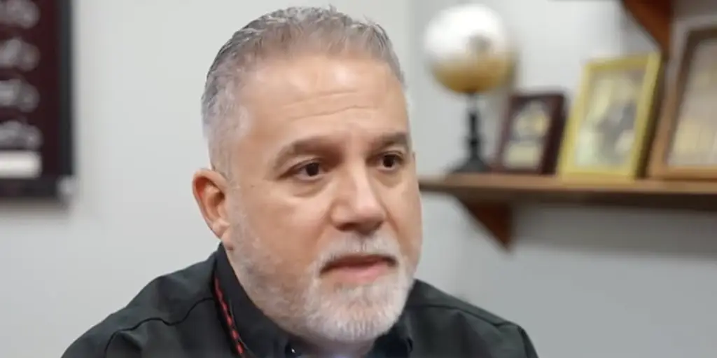 Juan Mejia, a passenger on the American Airlines flight which was forced to diver after a man had to be duct-taped to a seat, has revealed more about the incident. Credit: News 4 Tuscon KVOA-TV