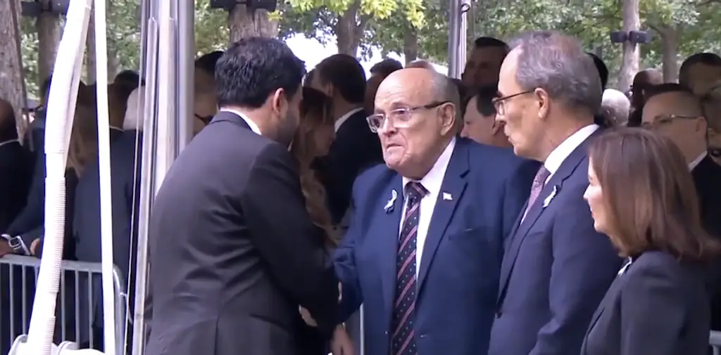 Zohran Mamdani and Rudi Giuliani shake hands during the 9/11 memorial. Credit: ABC News