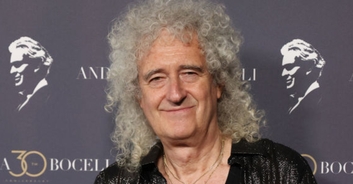 Queen guitarist Brian May reveals he suffered a stroke which left him 'unable to use his arm'