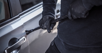 Moment armed car thieves attempt to steal family's vehicle with grandchildren in the backseat