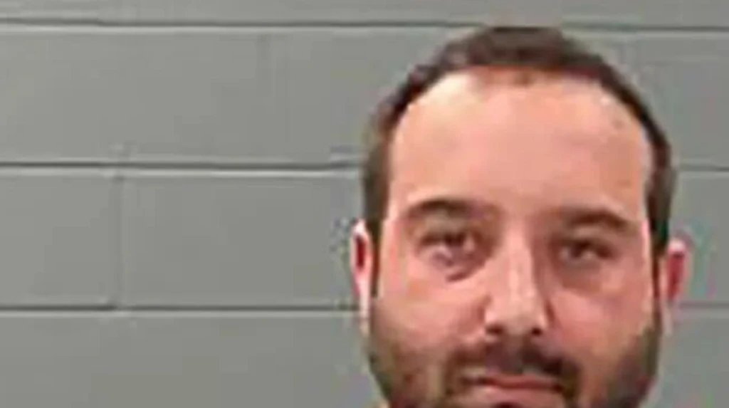 Police officer 'forced daughter, 6, to stand in snow and hold disturbing sign as punishment'