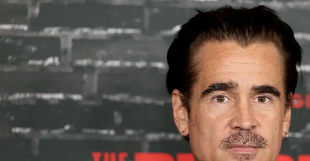 Actor Colin Farrell completes marathon while pushing friend in a wheelchair