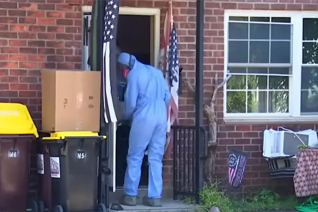 Police are cleaning out the apartment where the horrific incident took place. Credit : WNYT News Channel 13 Albany 