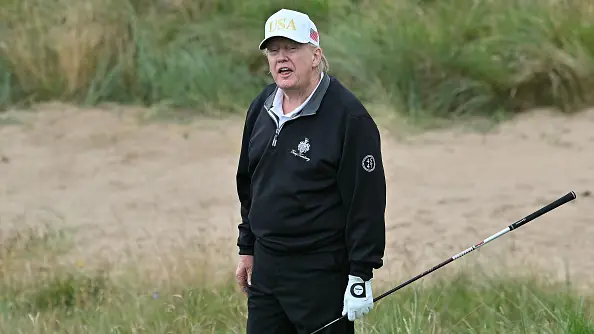 Donald Trump playing golf