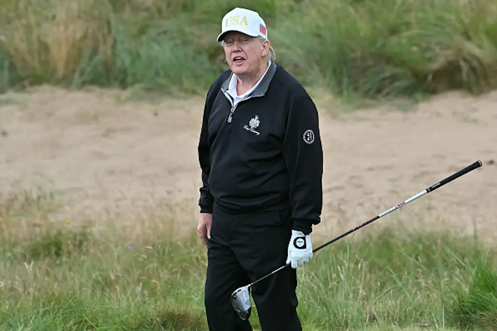 Donald Trump playing golf. Credit: ANDY BUCHANAN/AFP via Getty Images