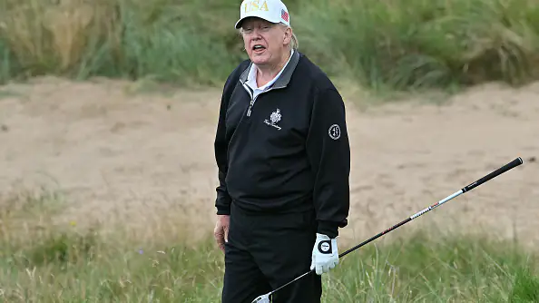 Donald Trump playing golf