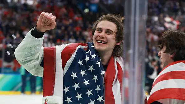 Jack Hughes celebrates USA's gold medal
