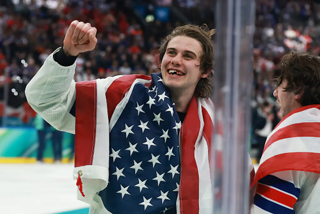 Jack Hughes celebrates USA's gold medal. Photo by Elsa/Getty Images