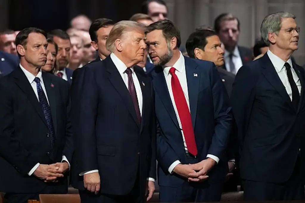 Donald Trump and JD Vance in conversation at the funeral of Senator Lindsey Graham. Credit: Andrew Harnik/Getty Images