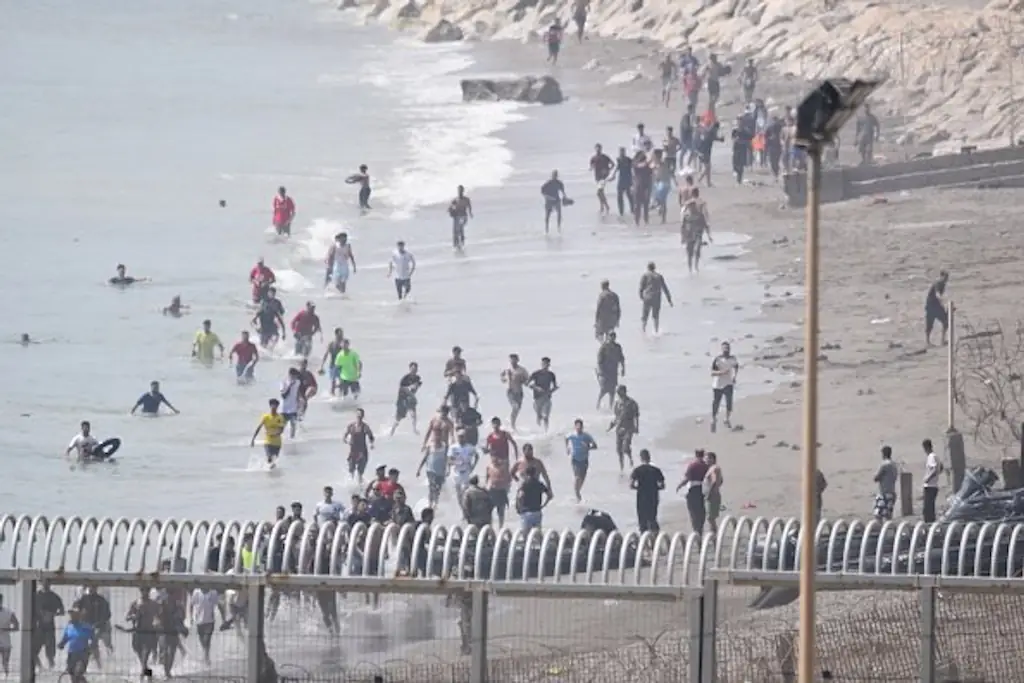 Thousands of Moroccan migrants crossed the Spanish border. Credit: Europa Press via Getty Images