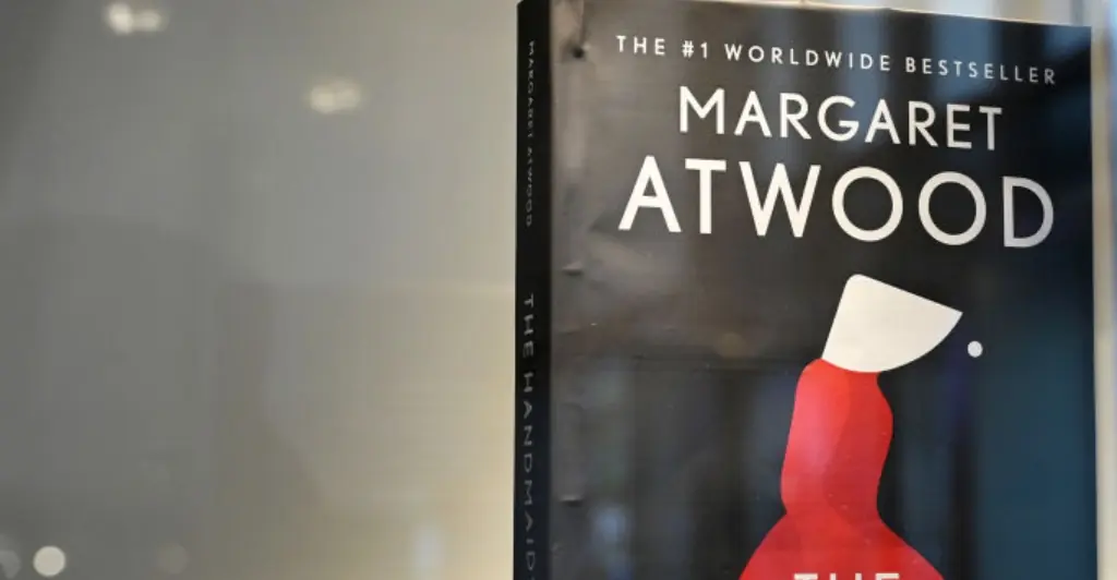 Moment Idaho high school graduate refuses to shake superintendent’s hand and drops a copy of 'The Handmaid's Tale' at his feet