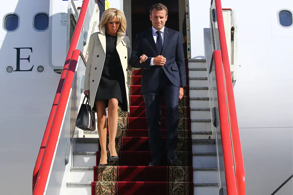 The Macrons exiting a plane. Credit: IMAGO / ITAR-TASS