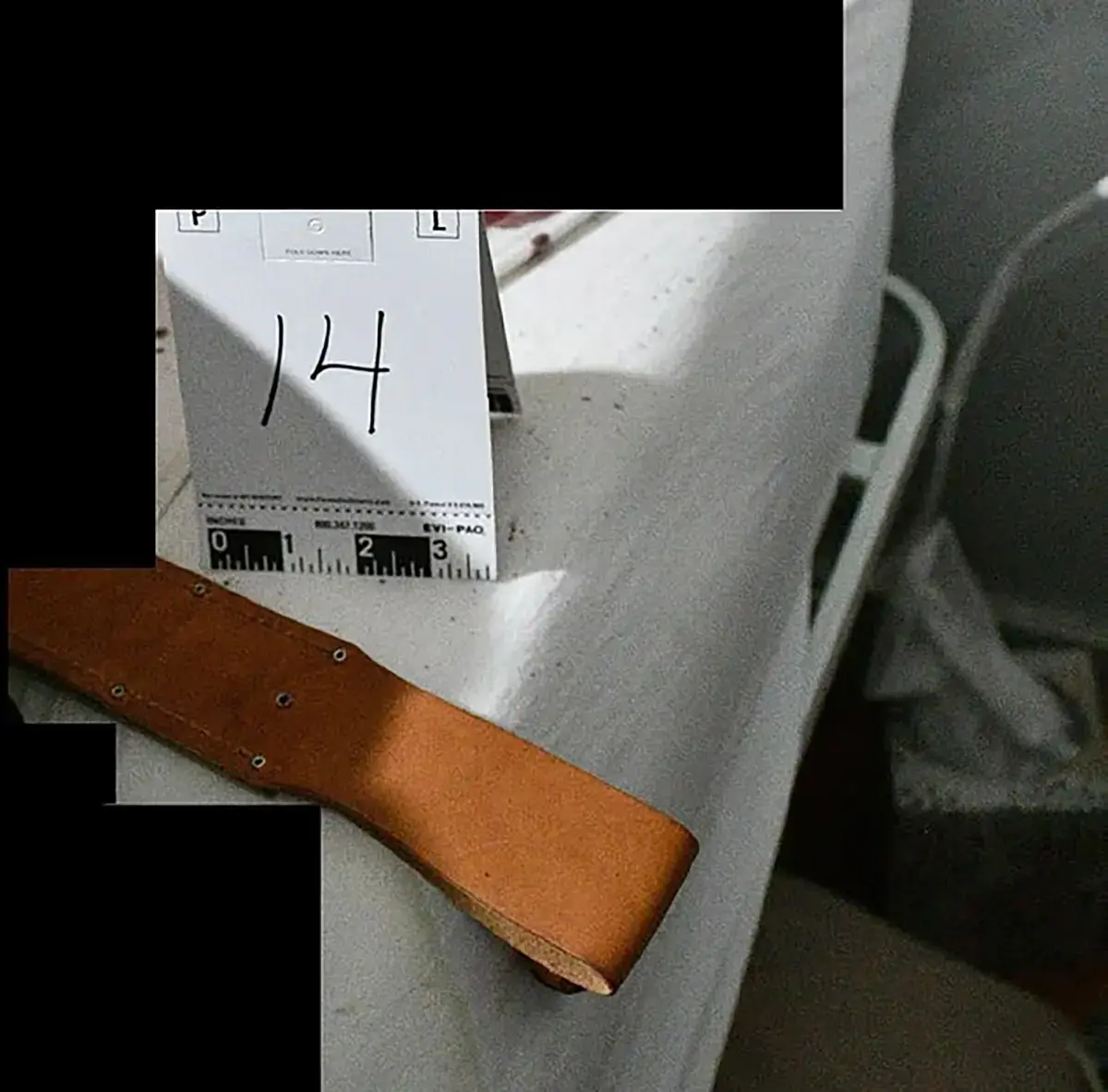 One of the items found at the scene was a 13-inch tan leather knife sheath that fit a KA-BAR-style combat knife. Credit: Idaho State Police