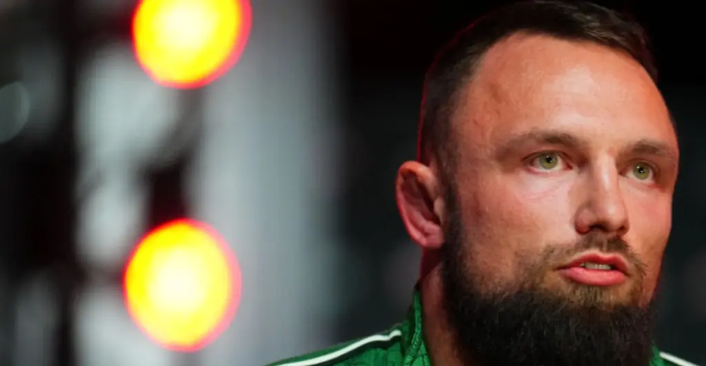 MMA fighter slammed for unwanted kiss on rival before intergender match