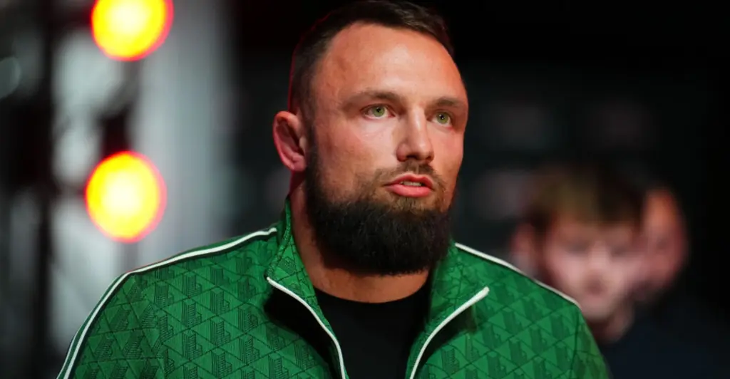 MMA fighter slammed for unwanted kiss on rival before intergender match