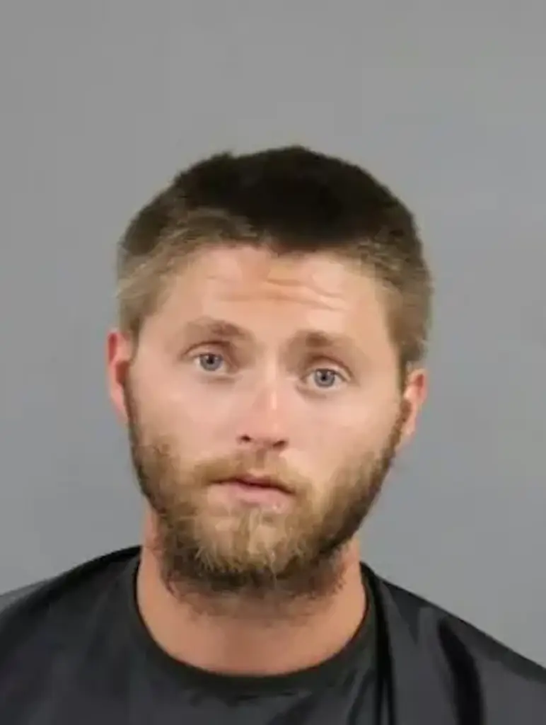 Justin Bearden, 24, and his wife were each charged with two counts of unlawful conduct towards a child. Credit: Anderson County Sheriff's Office SC