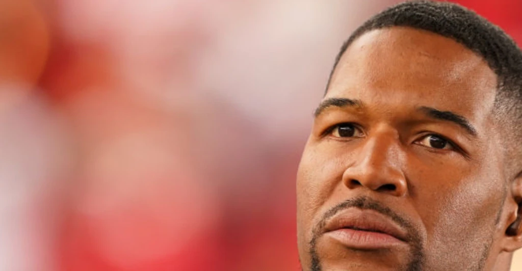 Michael Strahan speaks out over national anthem controversy as he is seen 'throwing reporter's phone'