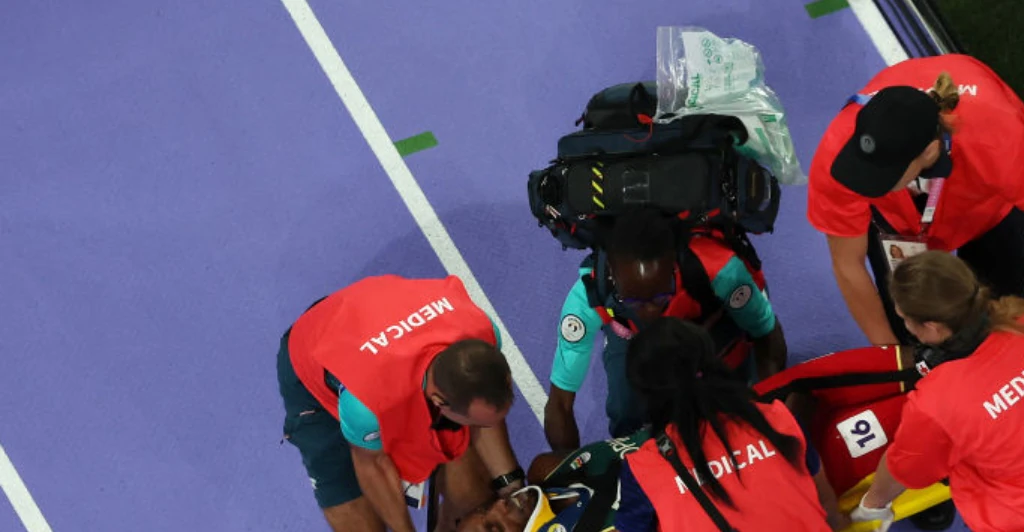 Olympics 3000-meter men's steeplechase athlete is carried off on stretcher in neckbrace after hitting his head in terrifying fall