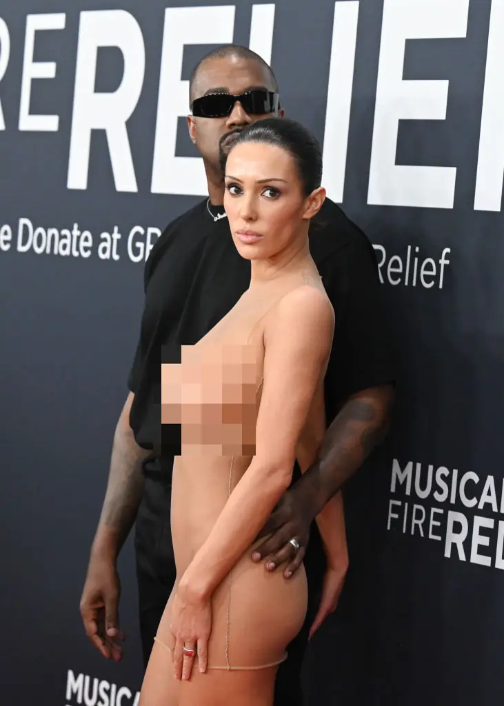 Kanye West opted for a more casual look. Credit: Gilbert Flores / Getty