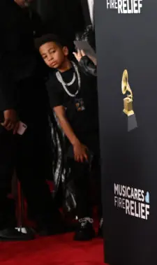 One kid couldn't help but sneak a closer look. Credit: Jon Kopaloff/WireImage/Getty