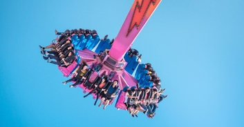 Amusement park guests left fearing for their lives as ride breaks down, leaving them dangling upside down