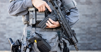 Incredible footage shows sniper take out bank robber with a single shot through a computer screen without harming any hostages