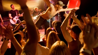 Concertgoer left partially paralyzed after punk-rock singer stage dives on top of her