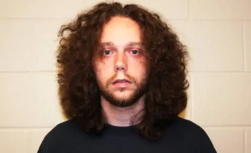 Chilling moment murderer realizes cops have found his victim's body on live TV