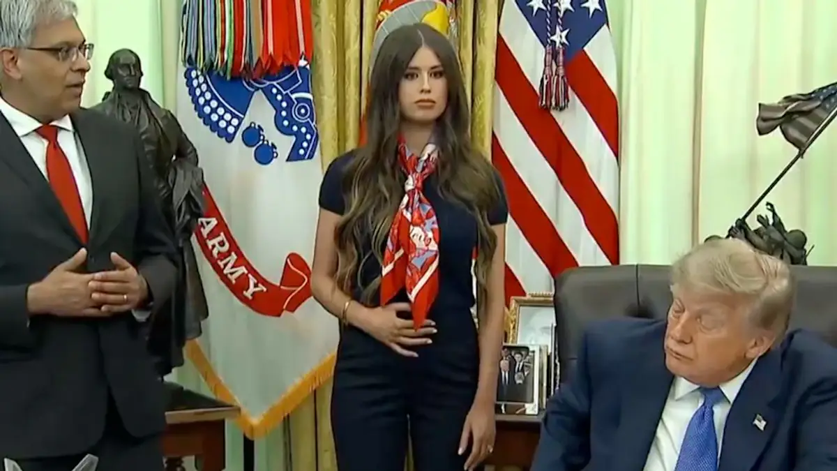 Mystery Woman Behind Trump Goes Viral After One Strange Gesture Sparks A Wild Theory