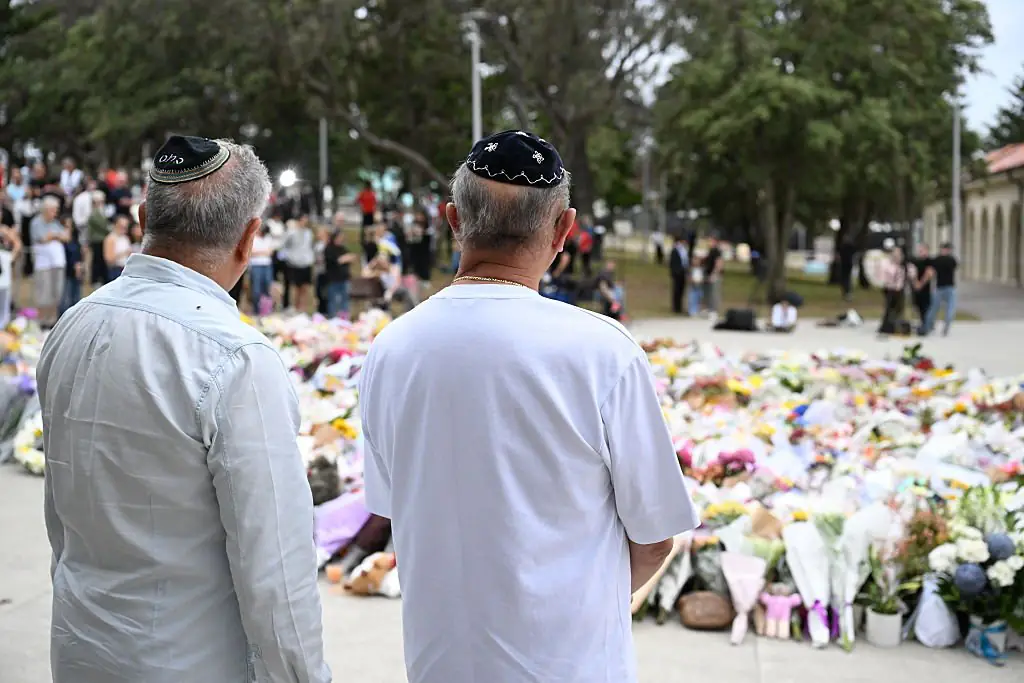 A horrifying shooting unfolded during a Hanukkah celebration at Bondi Beach on December 14. Credit: James D. Morgan / Getty