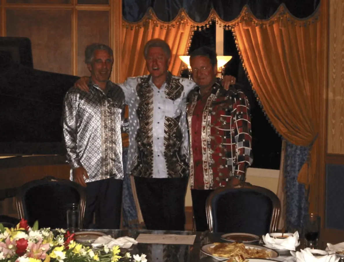 Jeffrey Epstein and Bill Clinton in a photo released by the Justice Department. Credit: Department Of Justice.