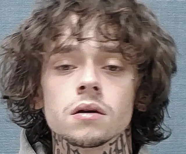 Shane C.L. Newman pictured in a booking photo. Credit: Canton Police Department.