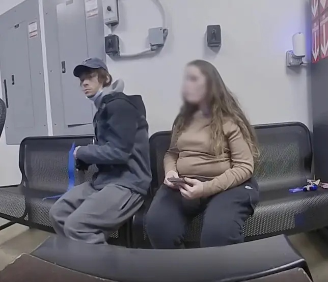 Shoplifting suspect Shane C.L. Newman captured on security video inside a Walmart loss prevention office in Canton, Ohio. Credit: Canton Police Department.