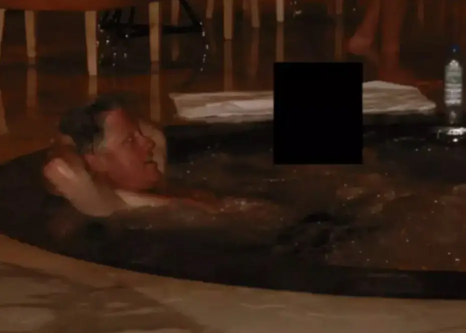 An image showing Bill Clinton in a hot tub. Credit: Department of Justice
