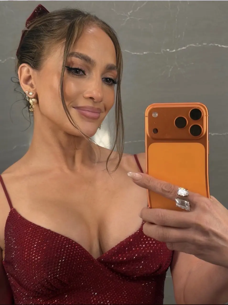 Fans noticed that JLo's phone was warped in the image. Credit: X/JLo