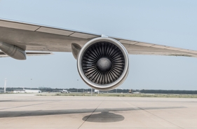 American Airlines plane erupts into flames forcing passengers onto aircraft wing