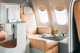 Man's brazen act while flying first class leaves the internet divided: 'Money doesn't buy class'