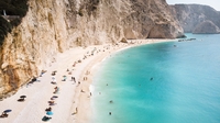 Woman's 'petty' revenge on couple who sat in front of her at the beach divides social media users