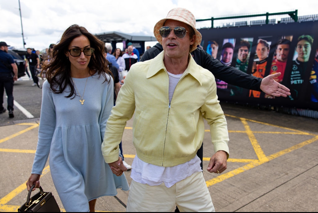 Ines de Ramon and Brad Pitt arrive at the British Grand Prix.  GettyImages-2161032459.jpg