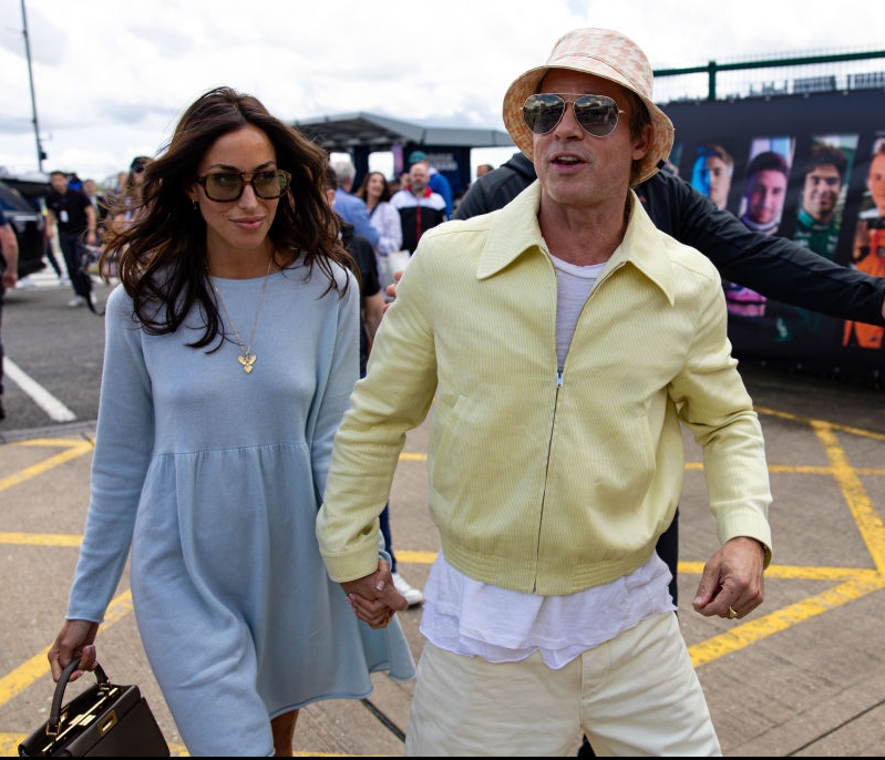 Ines de Ramon and Brad Pitt arrive at the British Grand Prix.  GettyImages-2161032459.jpg