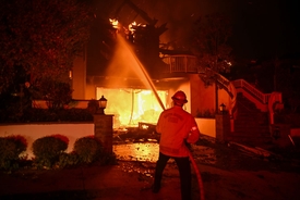 Amputee father dies in LA wildfires after staying behind to wait for his disabled son