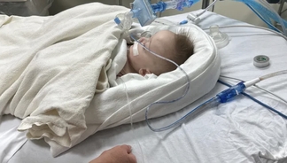 Woman's boyfriend gave her baby boy a bear hug - now the baby is fighting for his life in hospital