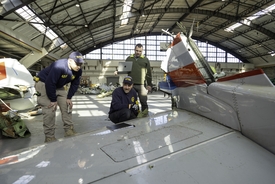 New photos of American Airlines plane wreckage as investigation begins into crash that killed 67
