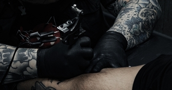 Woman with 99% of her body covered in tattoos shows fans what she looked like before her inkings