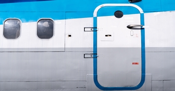 12 hospitalized after passenger opens plane door mid-flight