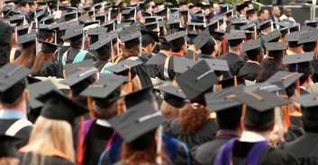 College student boldly grabs microphone from administrator to voice her anger on graduation day