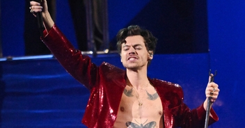 Harry Styles winces in pain after being once again hit in the eye by object thrown on stage by fan