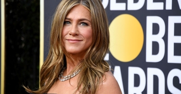 Jennifer Aniston, 54, hailed as 'most beautiful woman in the world' after showing off her abs